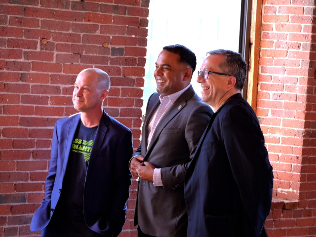 (L-R) Brian Boyles, executive director of Mass Humanities, Joshua Garcia, mayor of Holyoke, and Aaron Vega, director of planning and economic development for the city of Holyoke, and incoming board chair for Mass Humanities.